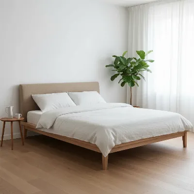 Thuma Classic Bed solid wood frame with a neutral duvet in a minimalist bedroom setting.
